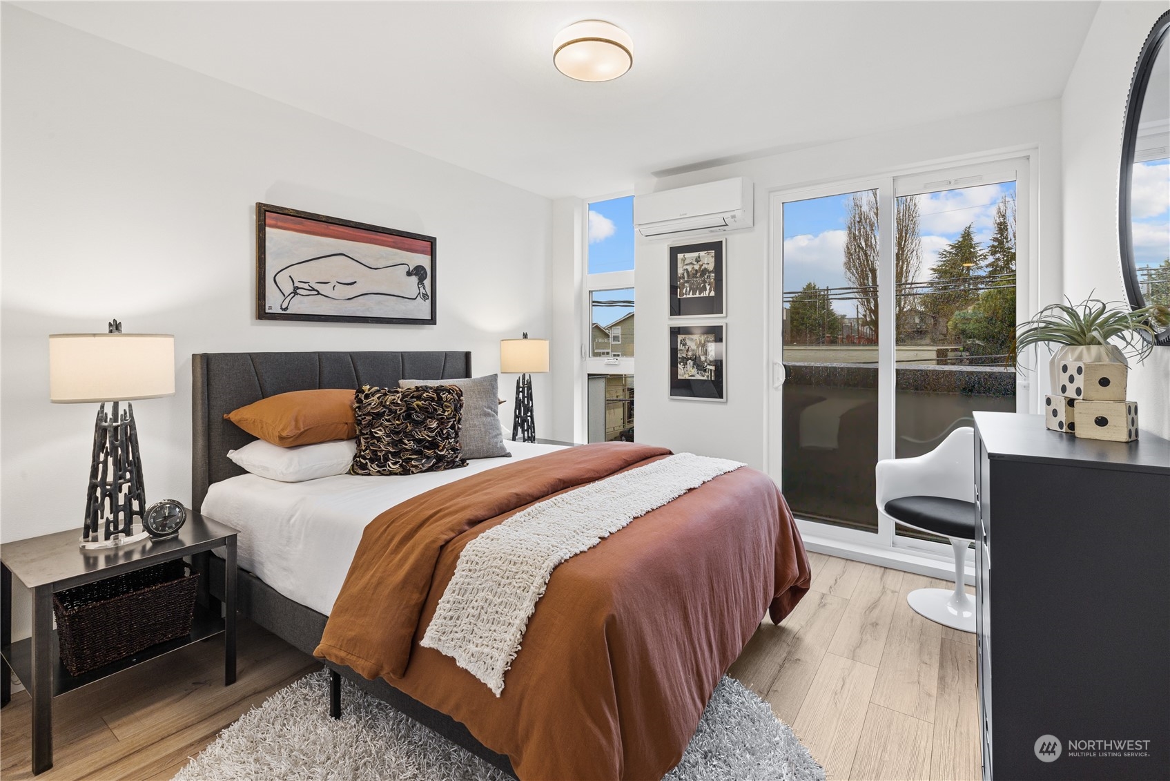 1425 East Howell Street Seattle, WA 98122 - Photo 15 of 20 a bedroom with a bed and a large window