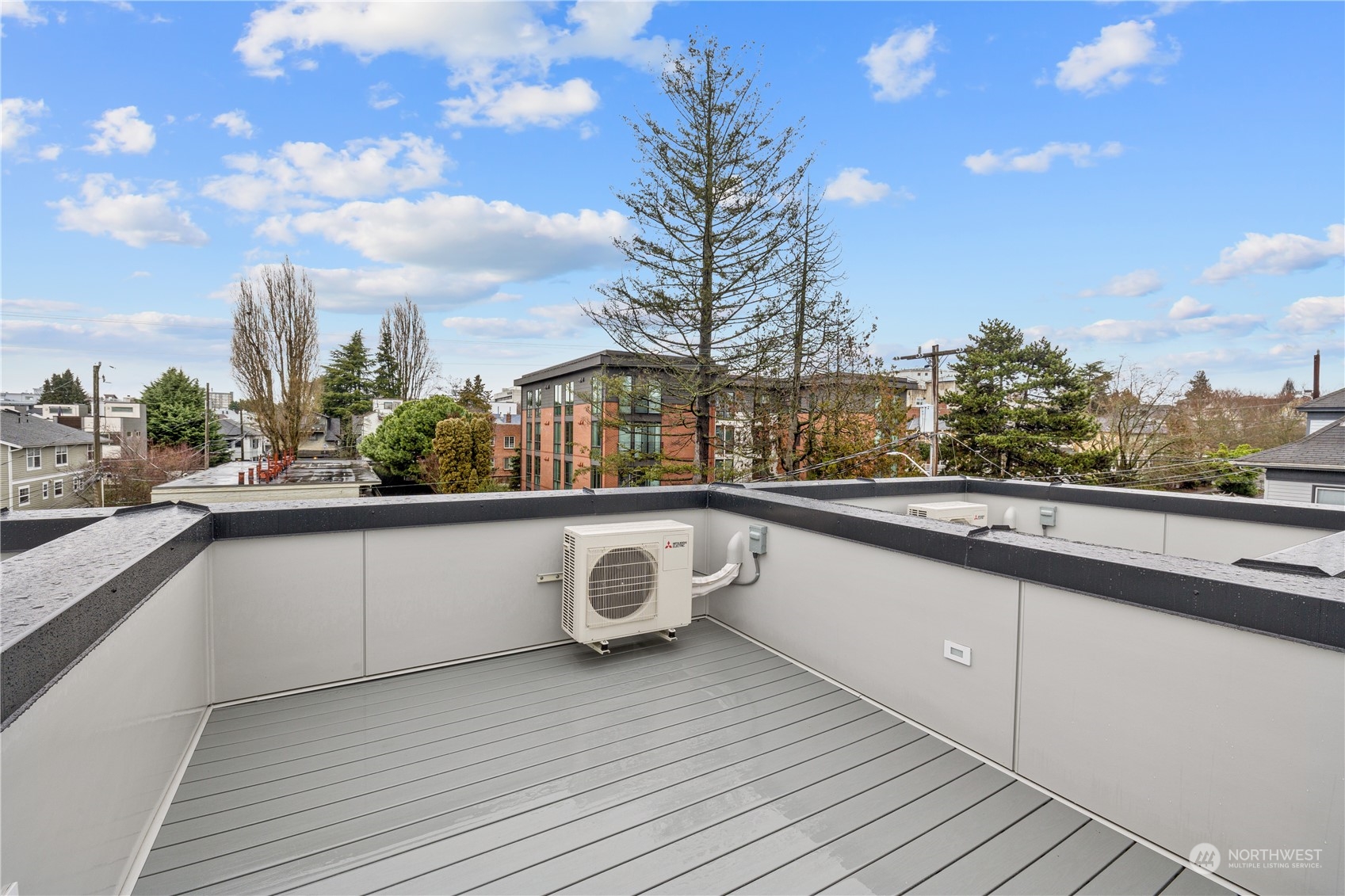 1425 East Howell Street Seattle, WA 98122 - Photo 18 of 20 a view of a balcony with trees