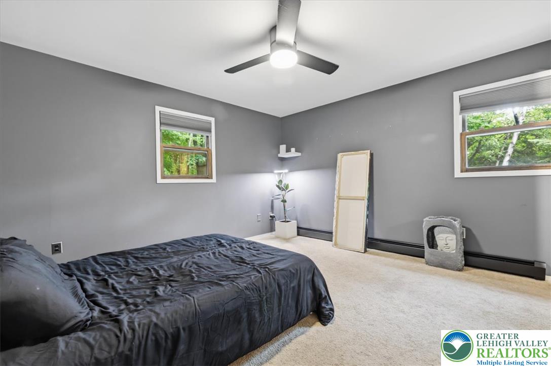520 Highland Hill Road Jim Thorpe, PA 18235 - Photo 25 of 83 A tranquil bedroom with neutral gray walls and soft carpeting invites restful slumber.