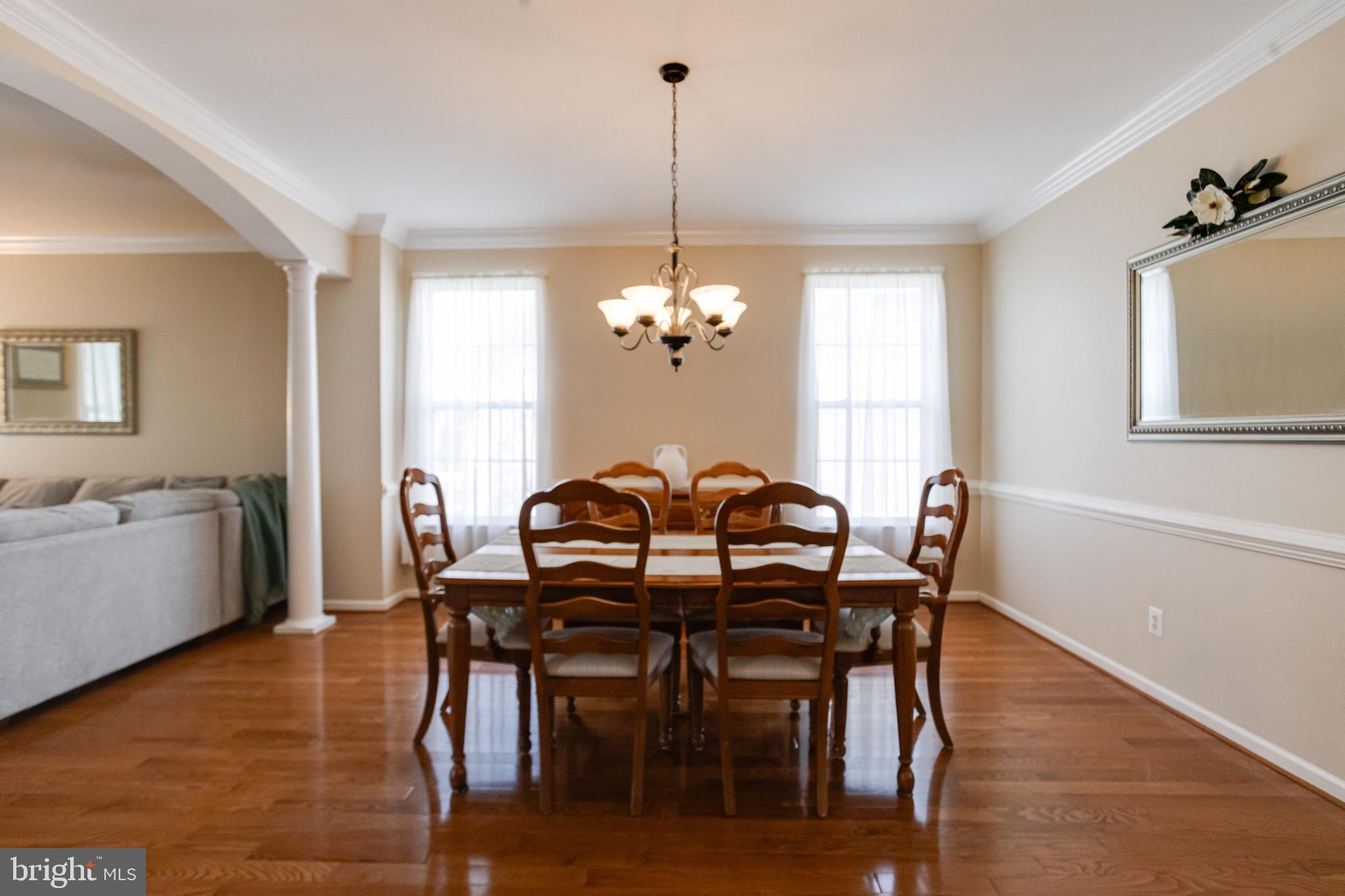 1705 Stone Ridge Court Bel Air, MD 21015 - Photo 16 of 81 a view of a dining room with furniture window and wooden floor