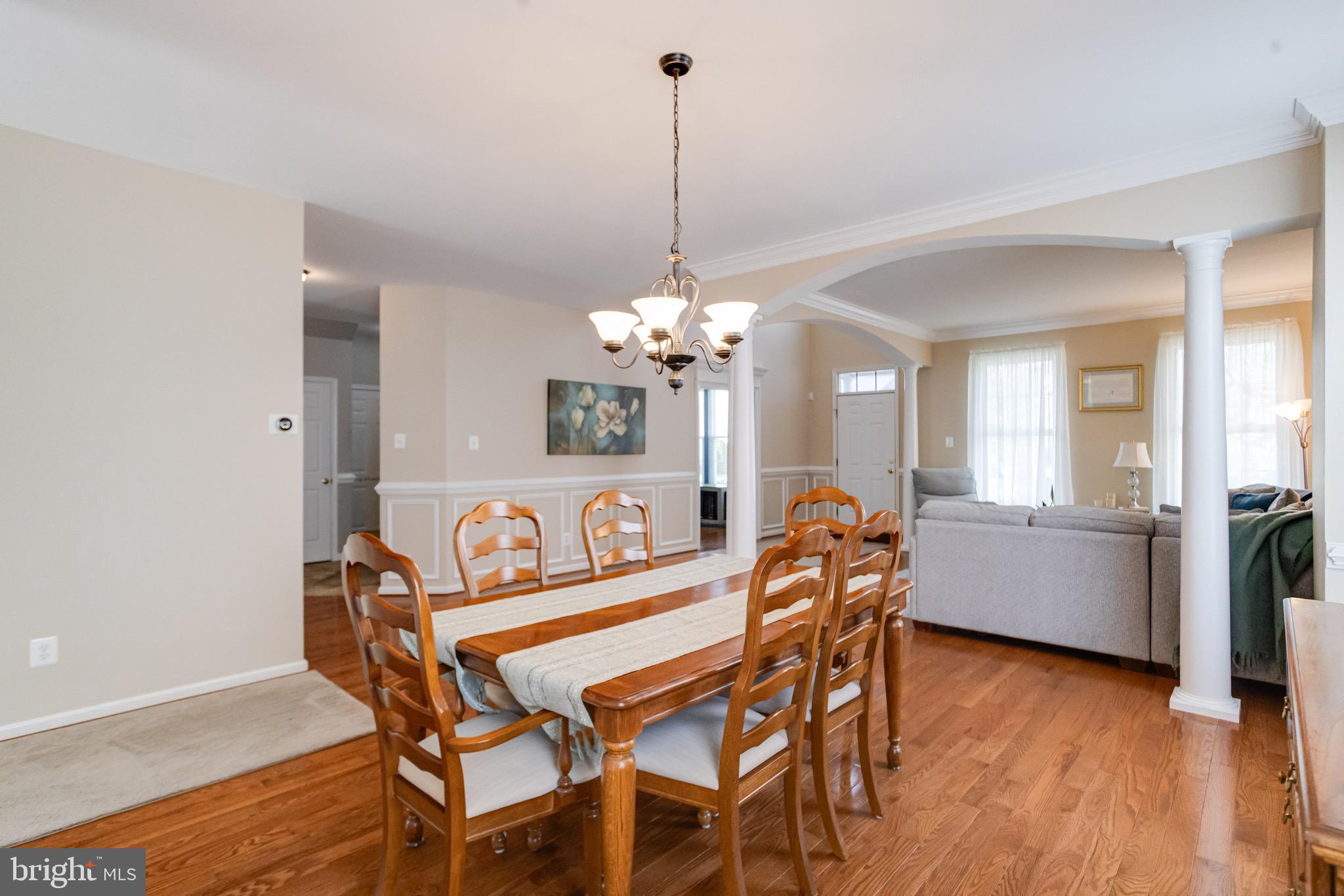 1705 Stone Ridge Court Bel Air, MD 21015 - Photo 18 of 81 a dining room with furniture and wooden floor
