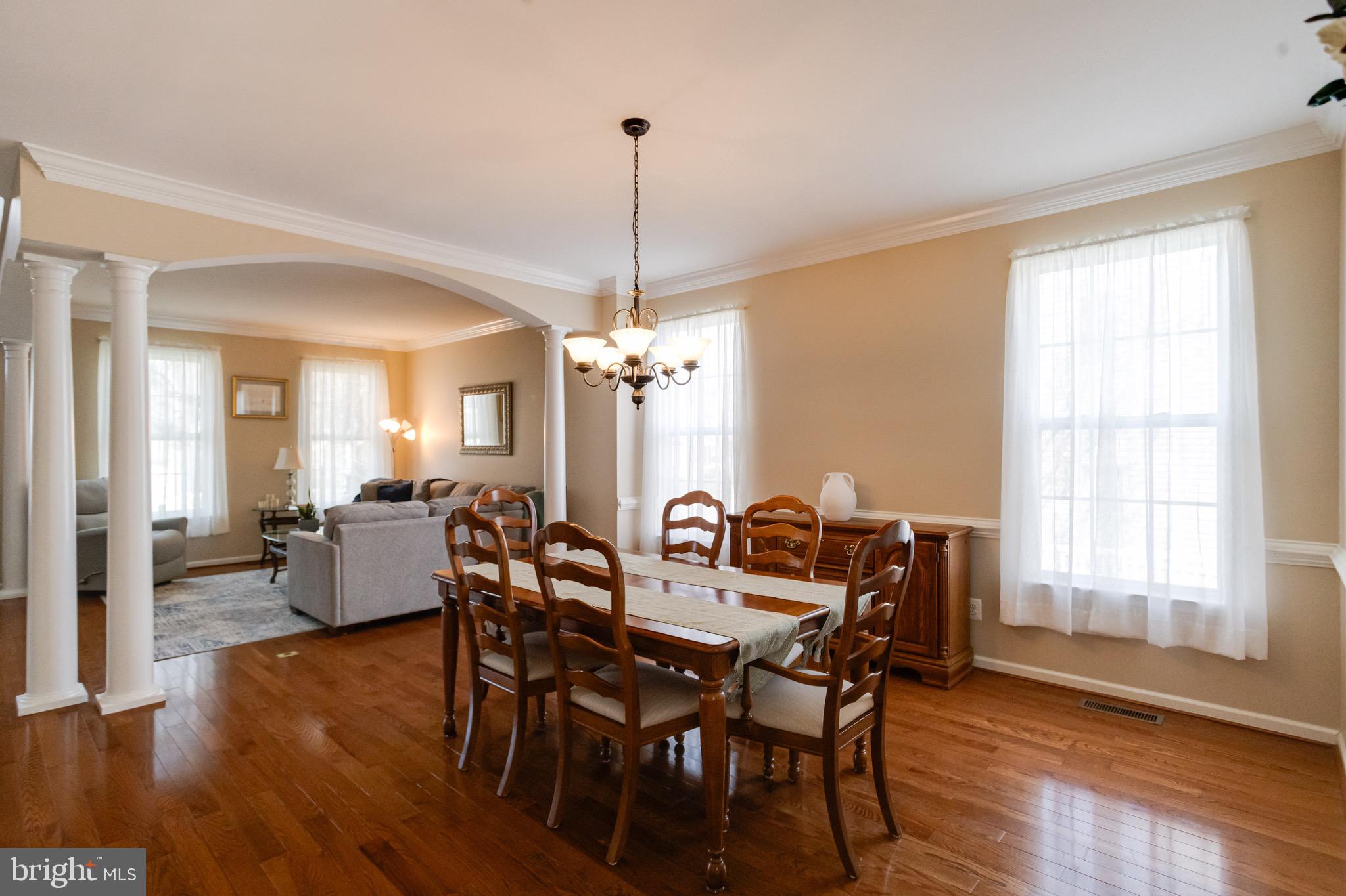 1705 Stone Ridge Court Bel Air, MD 21015 - Photo 19 of 81 a view of a dining room with furniture window and wooden floor