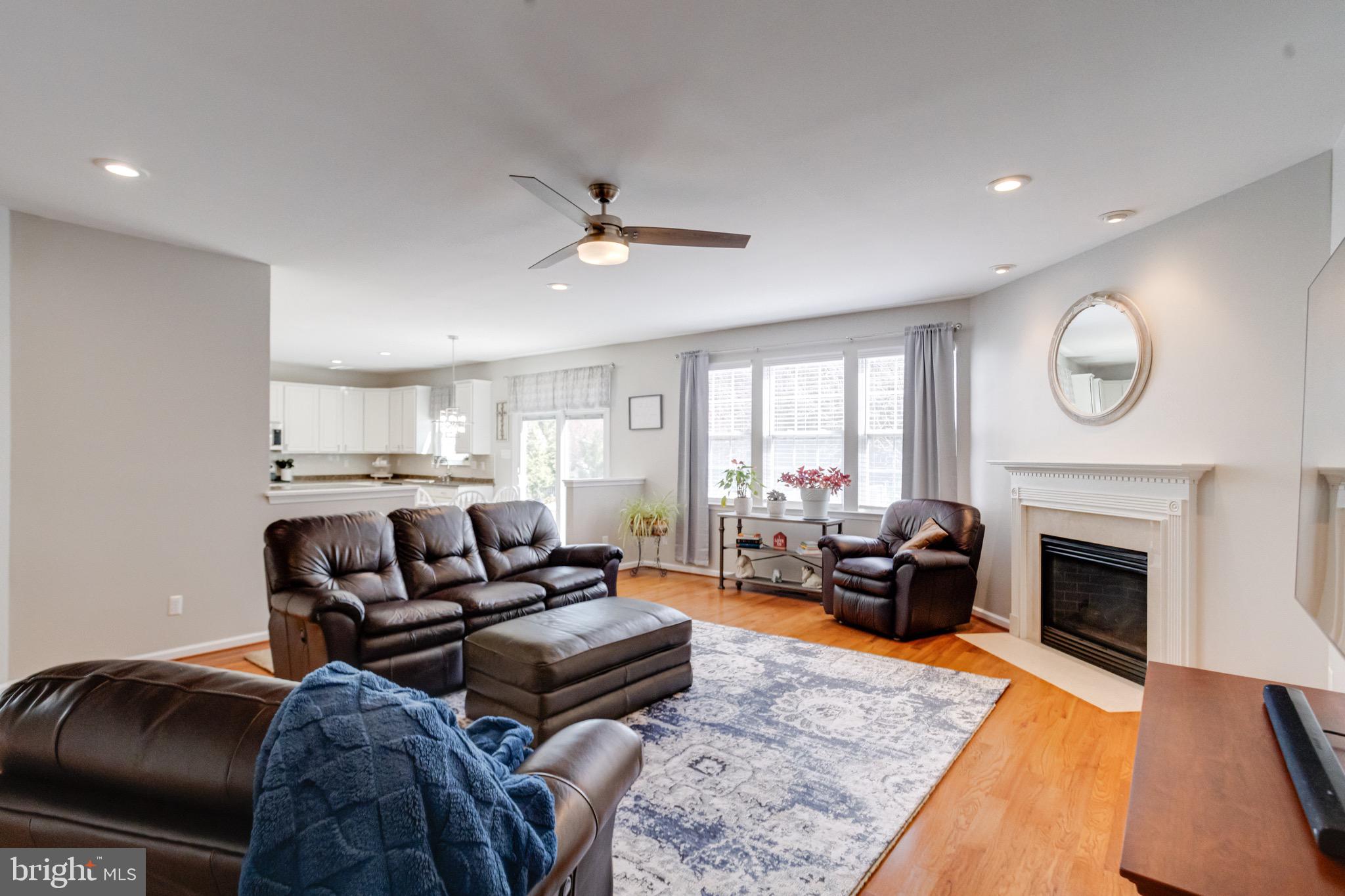 1705 Stone Ridge Court Bel Air, MD 21015 - Photo 22 of 81 a living room with furniture and a fireplace