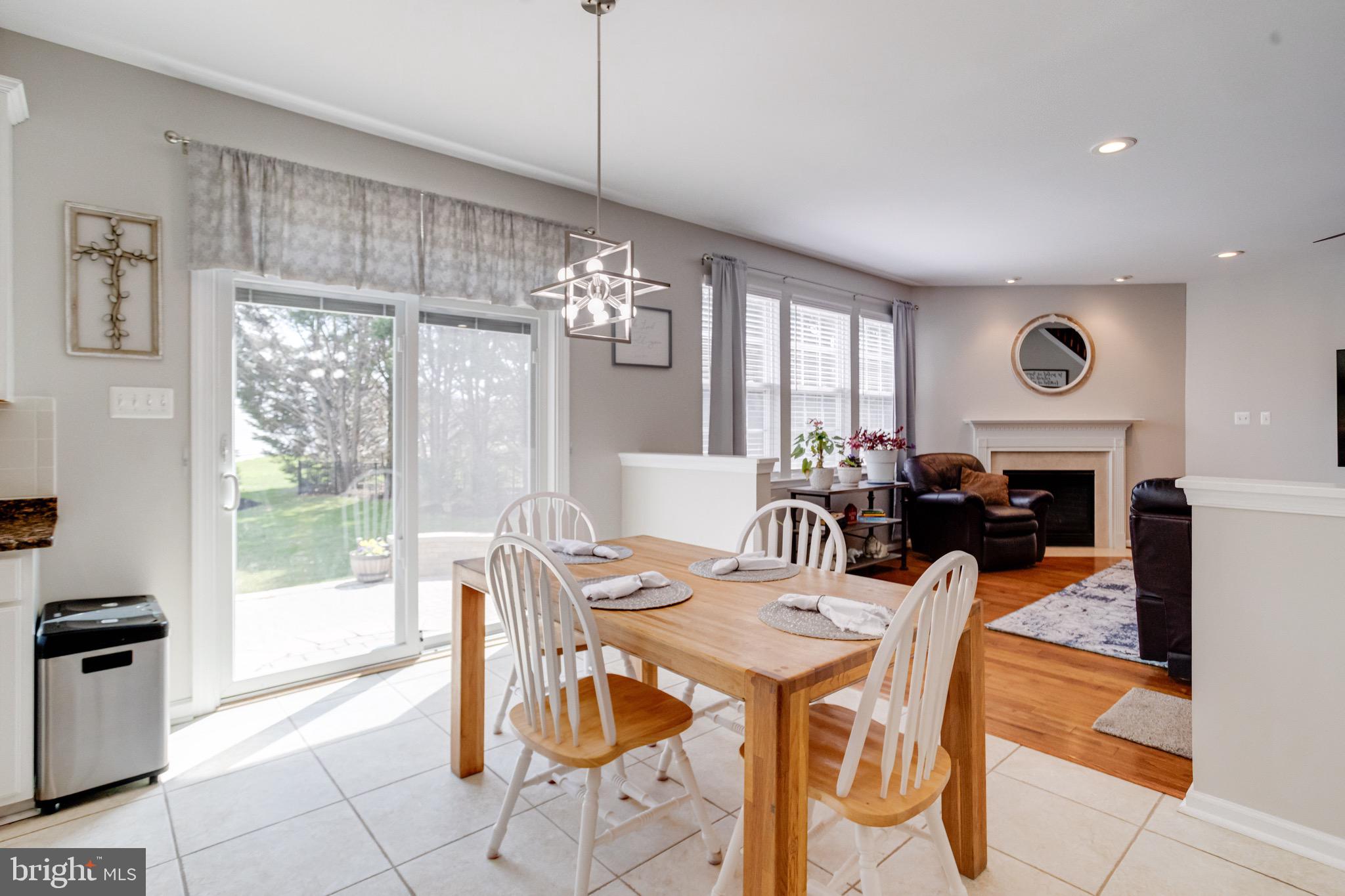 1705 Stone Ridge Court Bel Air, MD 21015 - Photo 26 of 81 a view of a dining room with furniture window and outside view