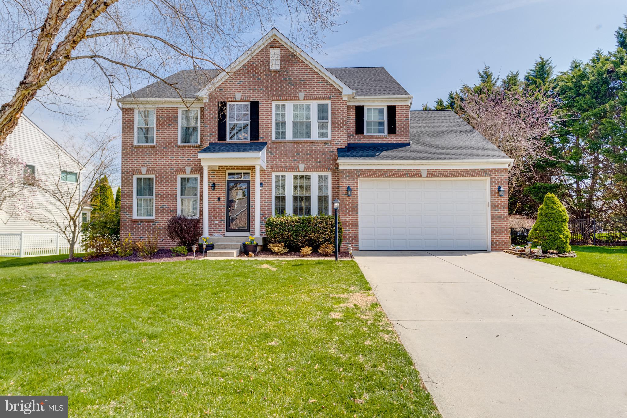 1705 Stone Ridge Court Bel Air, MD 21015 - Photo 3 of 81 a front view of a house with a yard