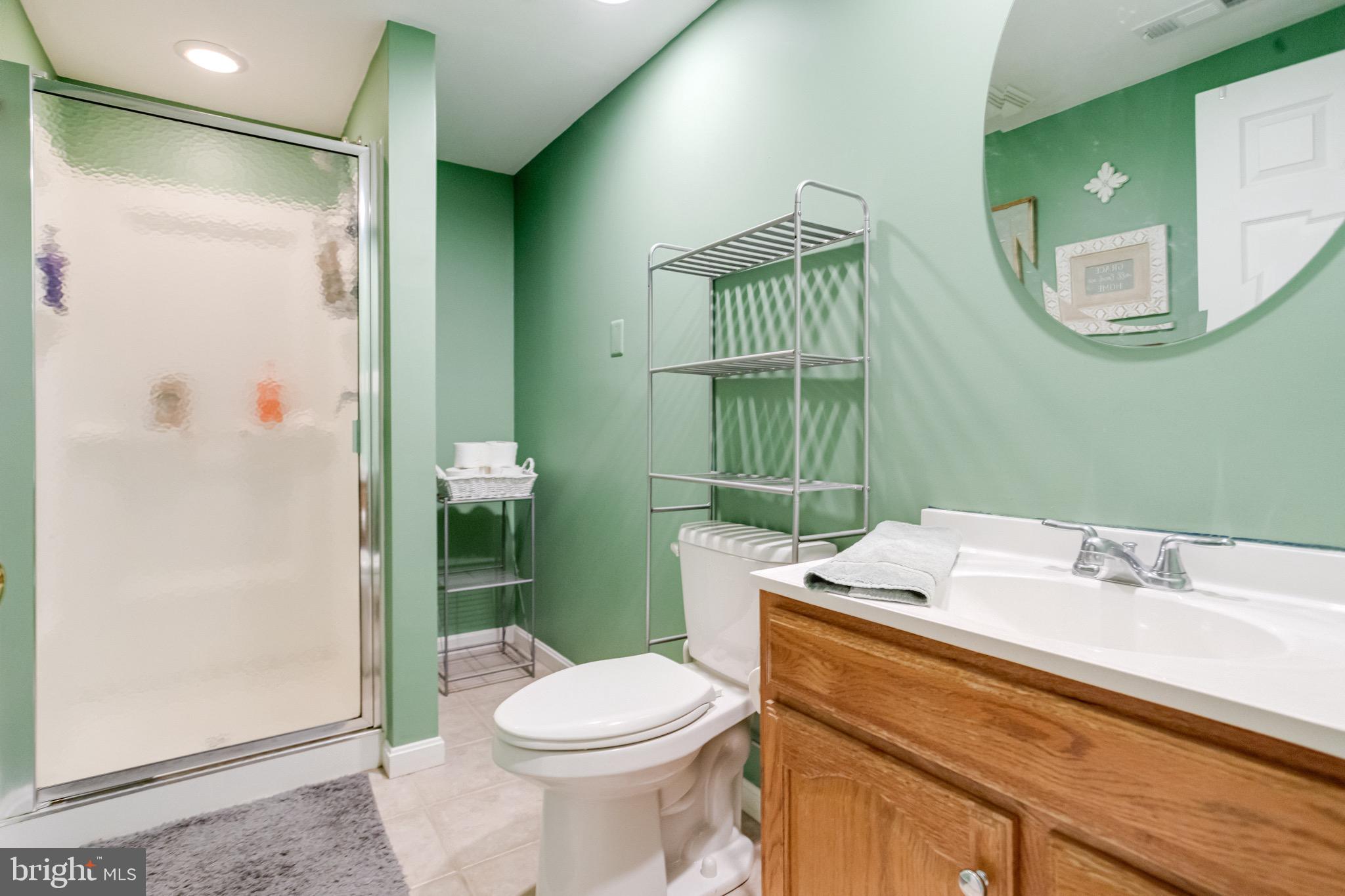 1705 Stone Ridge Court Bel Air, MD 21015 - Photo 65 of 81 a bathroom with a sink a toilet and shower