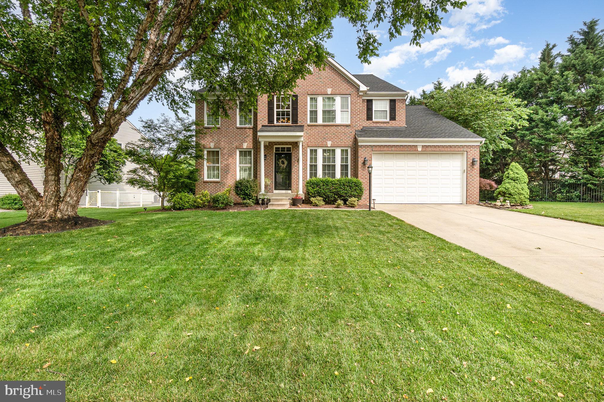 1705 Stone Ridge Court Bel Air, MD 21015 - Photo 7 of 81 a front view of a house with yard and green space