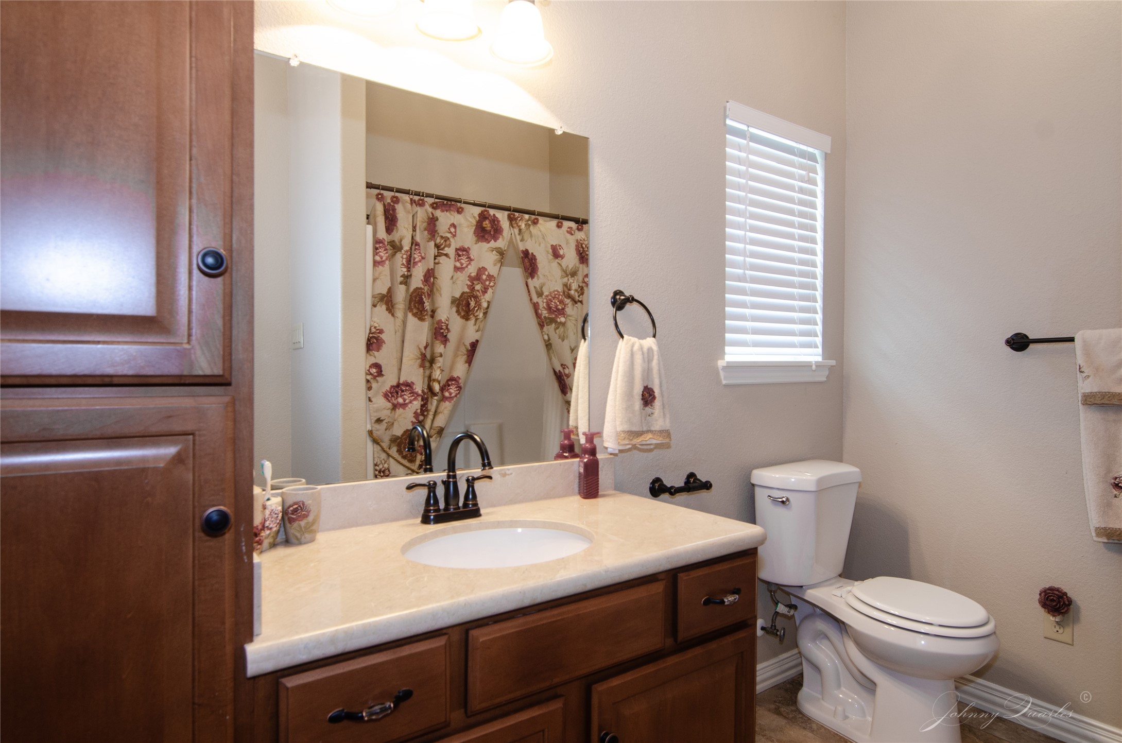 36606 Tejas Road Simonton, TX 77485 - Photo 30 of 35 a bathroom with a sink toilet and mirror