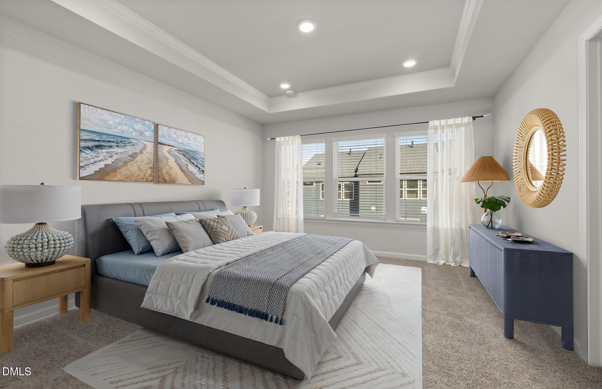 918 Fearless Road Durham, NC 27703 - Photo 11 of 25 a spacious bedroom with a bed a couch and a window