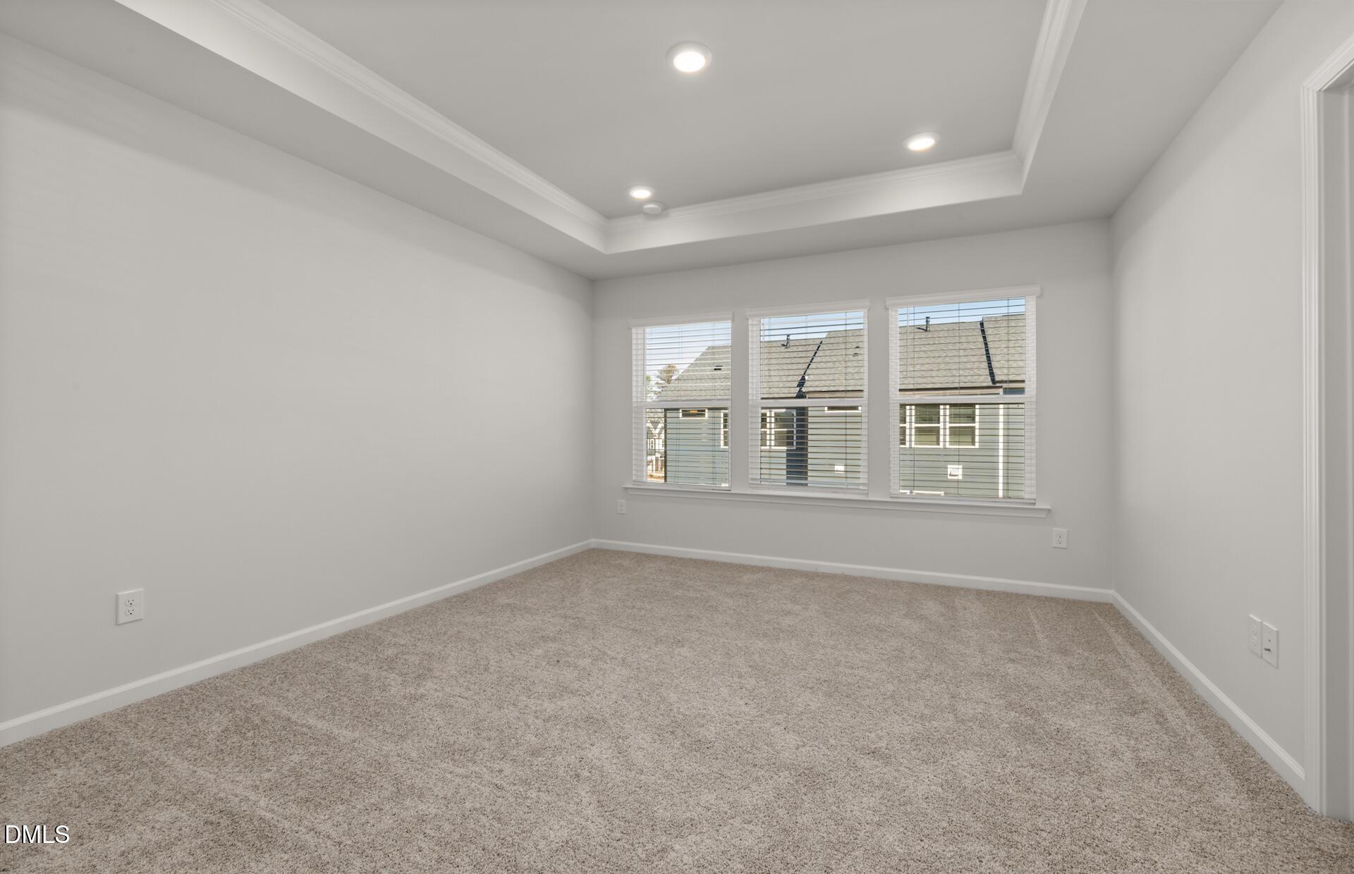 918 Fearless Road Durham, NC 27703 - Photo 12 of 25 an empty room with windows