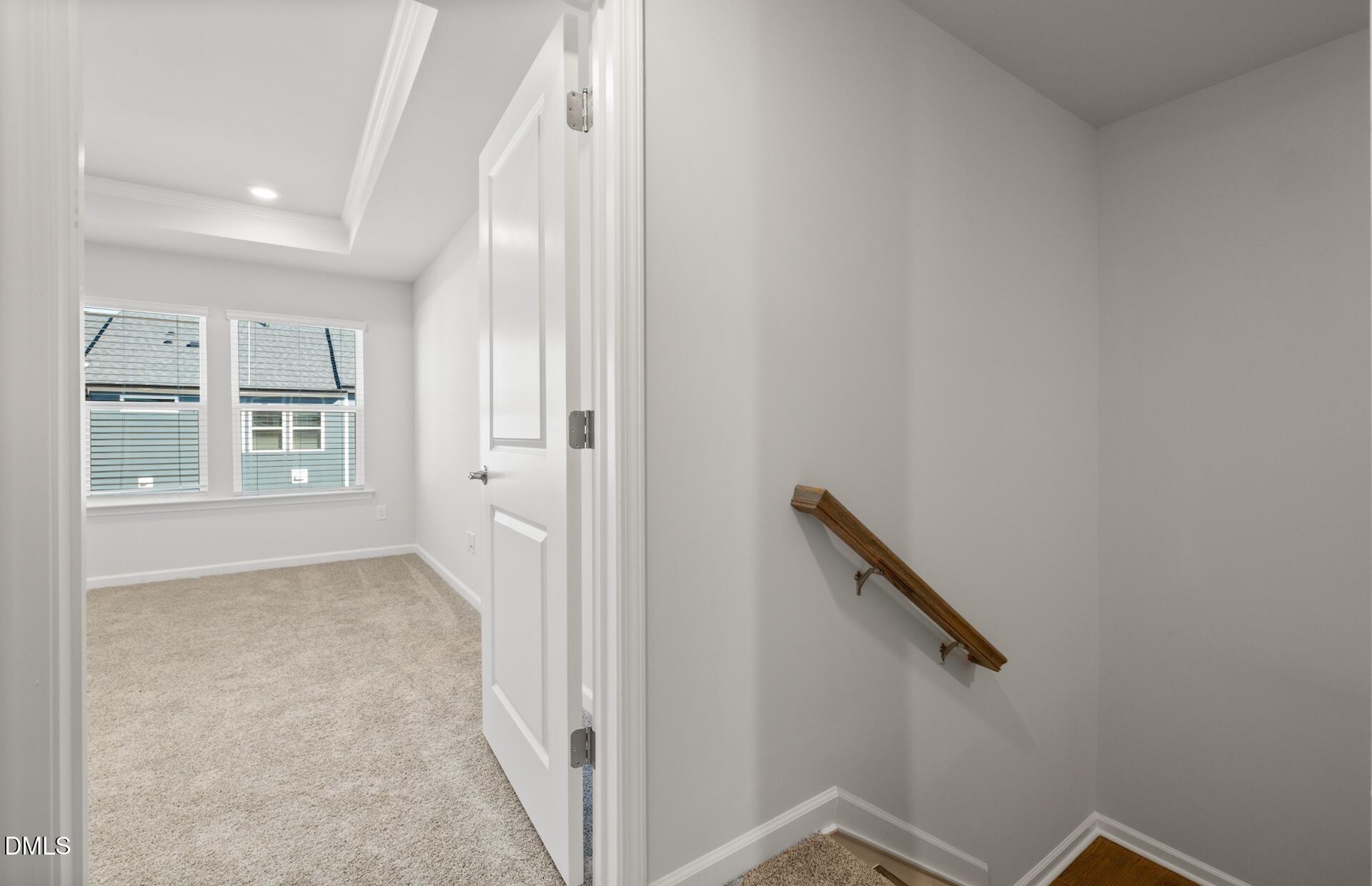 918 Fearless Road Durham, NC 27703 - Photo 18 of 25 a view of an empty room with windows