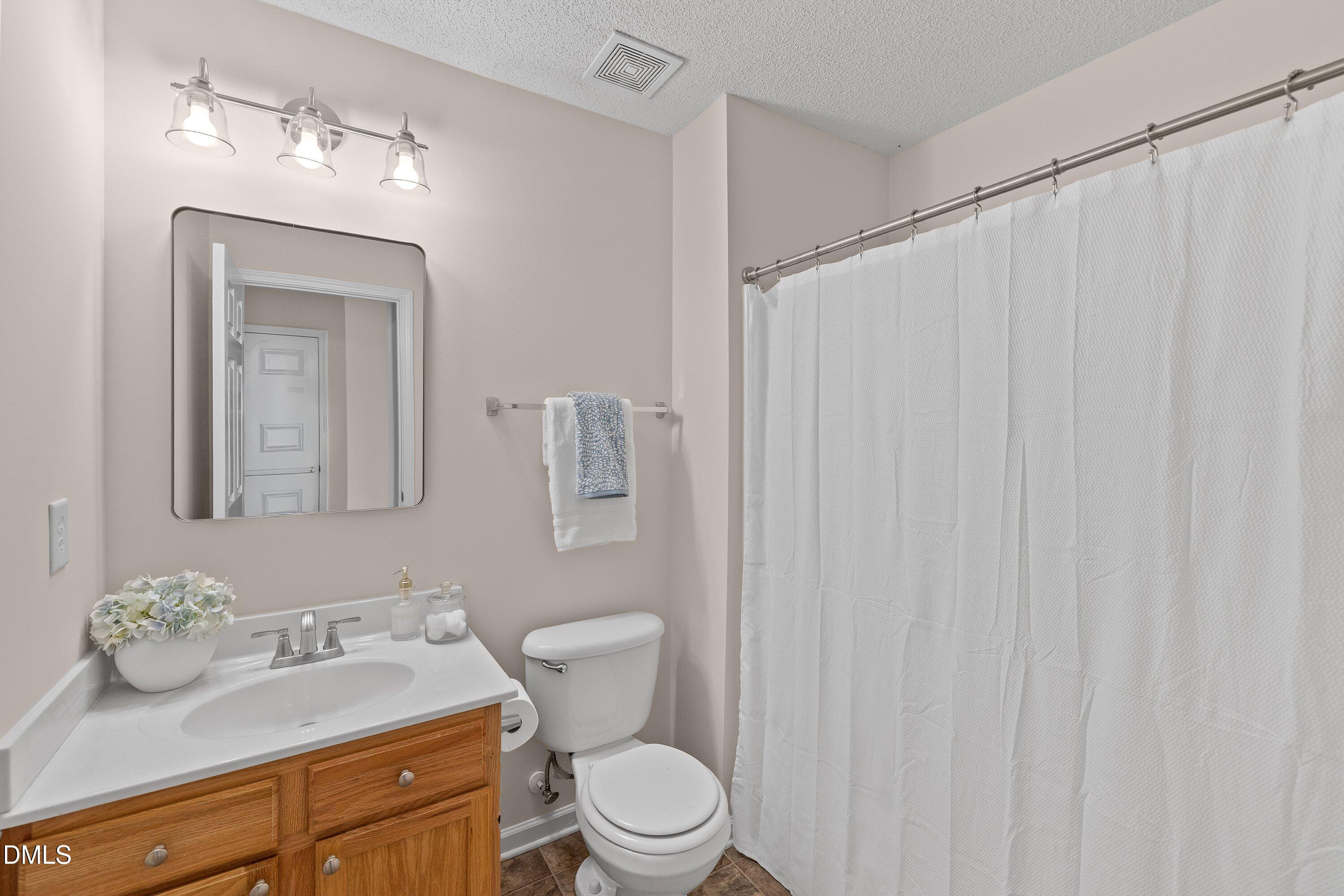 101 Graystar Road Apex, NC 27502 - Photo 27 of 36 Updated hall bath