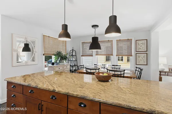 a kitchen with sink and stove