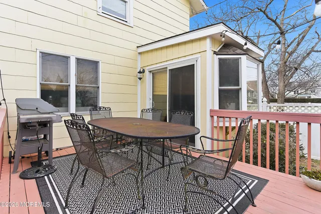 a view of an empty room and a window
