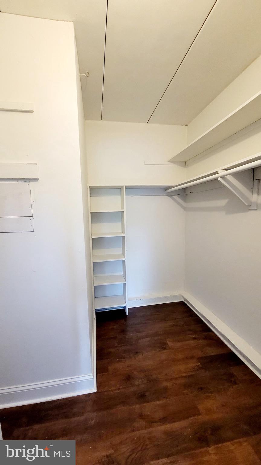 1575 West Street Road, Unit 832 Warminster, PA 18974 - Photo 13 of 14 a view of walk in closet with empty racks