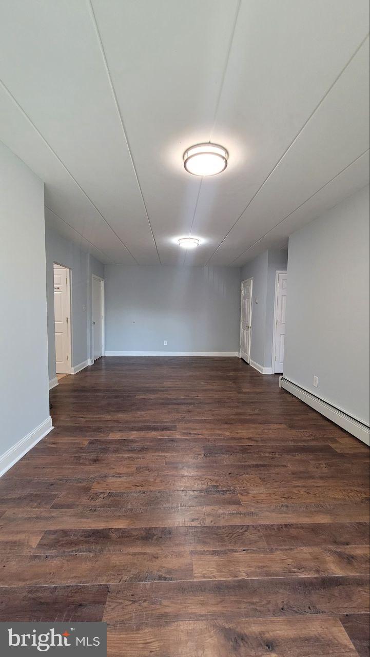 1575 West Street Road, Unit 832 Warminster, PA 18974 - Photo 5 of 14 a view of room and wooden floor