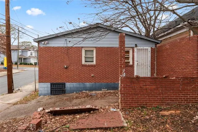 a front view of a house with parking