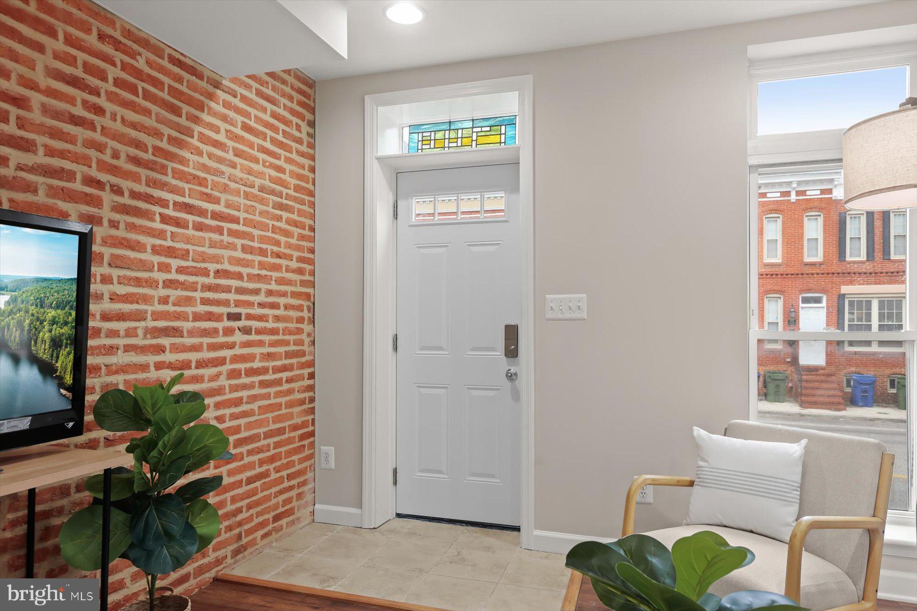 1749 South Hanover Street Baltimore, MD 21230 - Photo 2 of 55 a view of a workspace with furniture