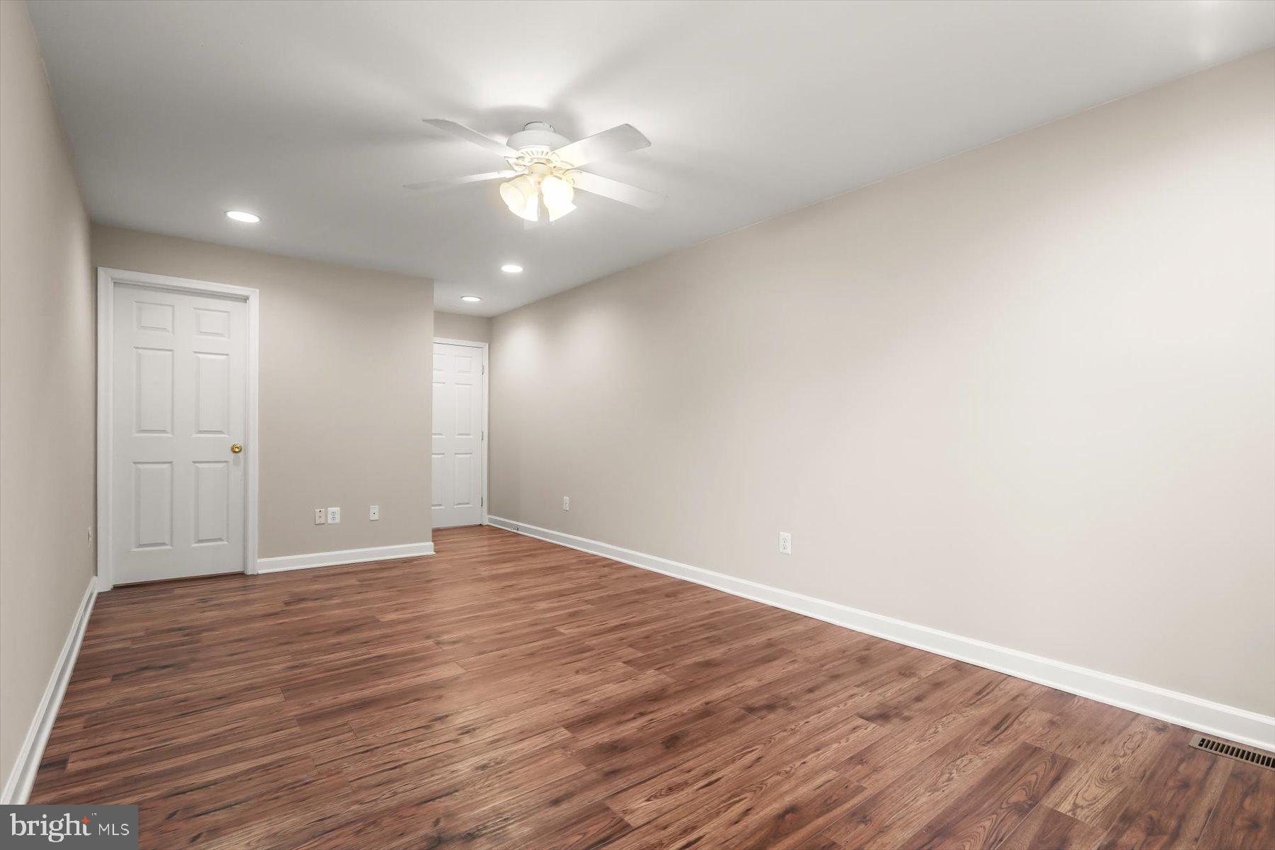 1749 South Hanover Street Baltimore, MD 21230 - Photo 27 of 55 wooden floor in an empty room
