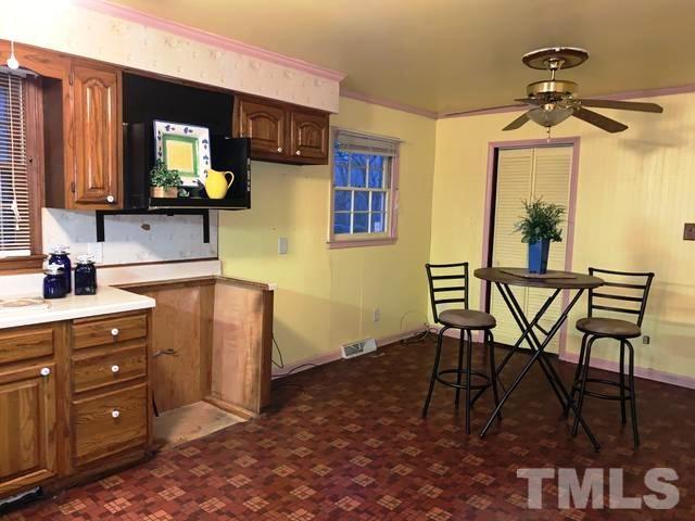202 Lancaster Road Mebane, NC 27302 - Photo 5 of 9 a dining room with furniture and window