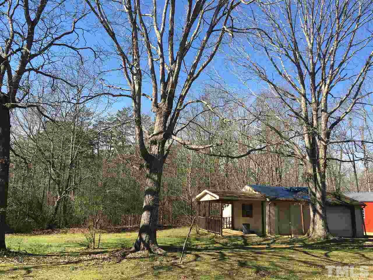 202 Lancaster Road Mebane, NC 27302 - Photo 9 of 9 a front view of a house with a yard