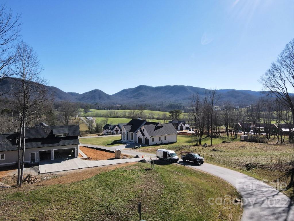5 Ted Linn Drive Fairview, NC 28730 - Photo 11 of 20 a view of a house with yard and sitting area