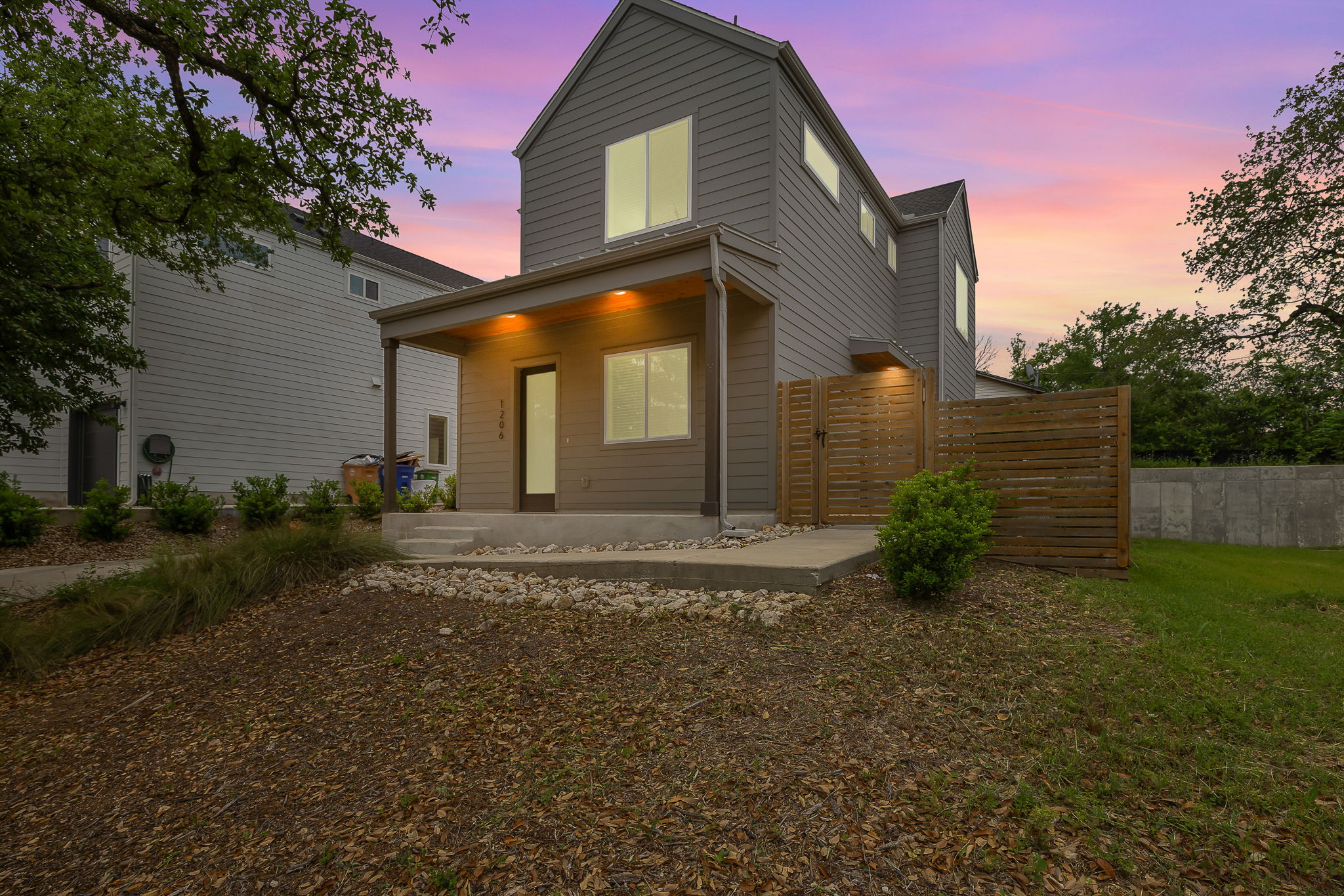 1206 Sarabeth Way Austin, TX 78721 - Photo 1 of 27 View of front of house with fence