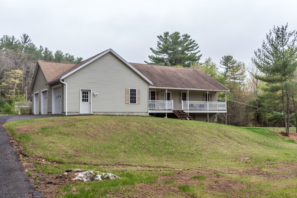 5294 South Athol Road Athol, MA 01331 - Photo 1 of 13 a house with trees in the background