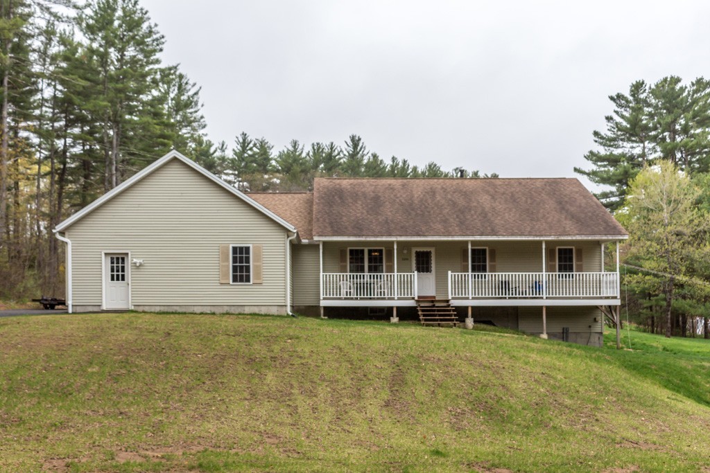 5294 South Athol Road Athol, MA 01331 - Photo 12 of 13 a view of a house with a yard and large trees