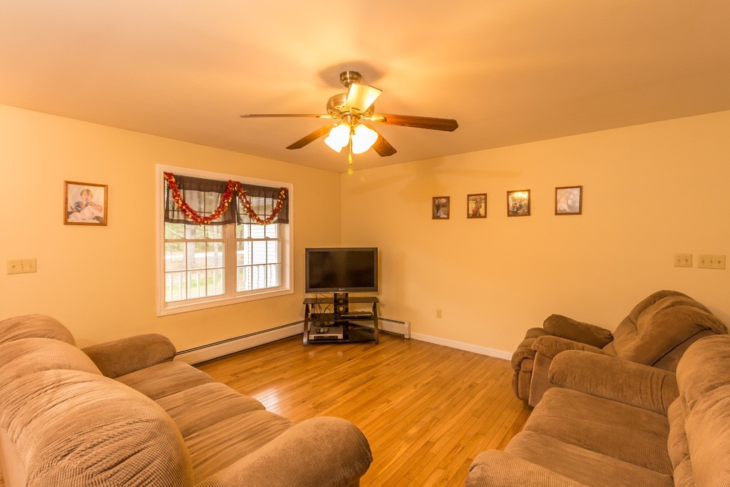 5294 South Athol Road Athol, MA 01331 - Photo 3 of 13 a bedroom with a bed furniture and a window