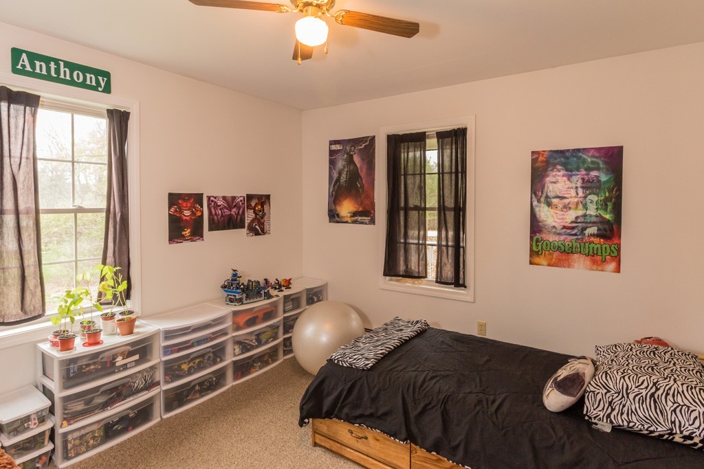 5294 South Athol Road Athol, MA 01331 - Photo 6 of 13 a bedroom with a bed and a window