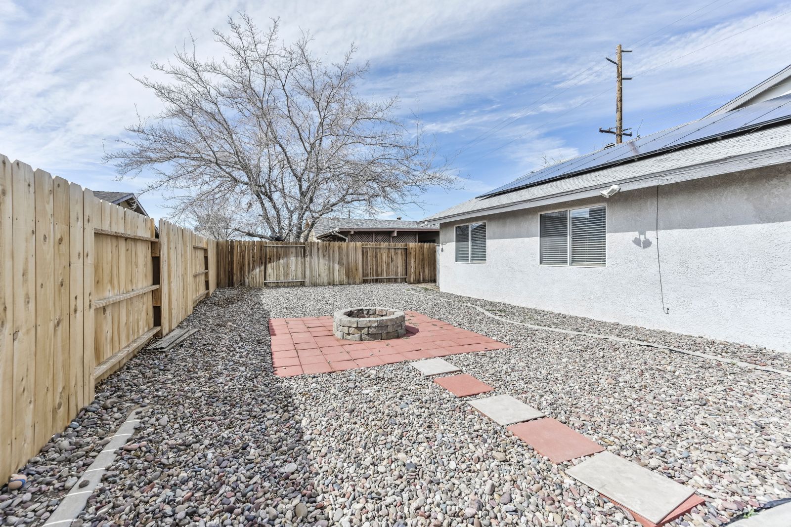 633 East Church Avenue Ridgecrest, CA 93555 - Photo 26 of 27 a front view of a house with garden