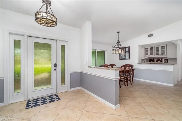 a view of a livingroom with furniture window and wooden floor