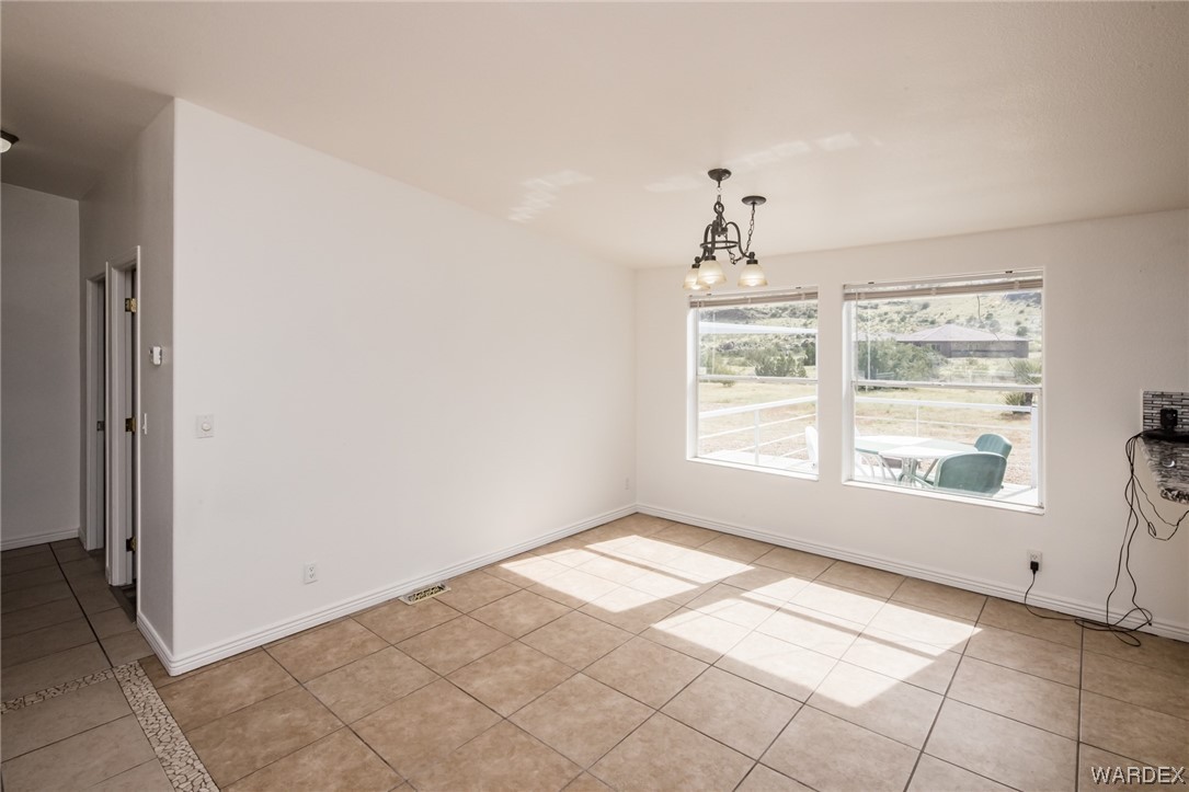 1949 Growler Road Golden Valley, AZ 86413 - Photo 16 of 87 a view of an empty room with a window