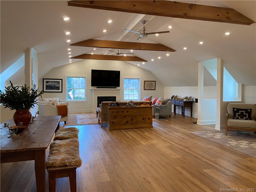 55 Still Meadow Road Sharon, CT 06069 - Photo 22 of 22 a living room with furniture and a flat screen tv