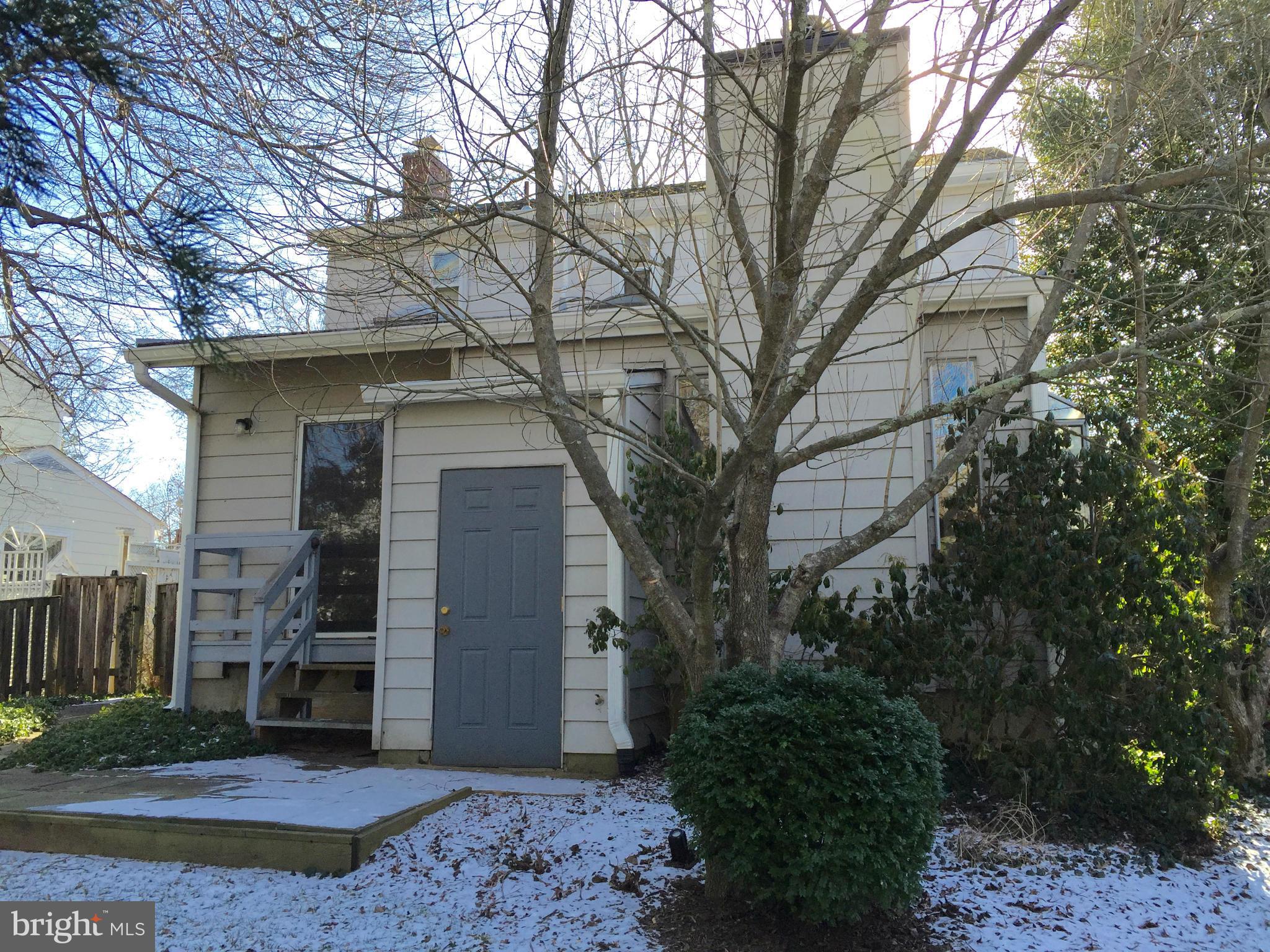 4915 Redford Road Bethesda, MD 20816 - Photo 2 of 15 a wooden house with trees in front of it