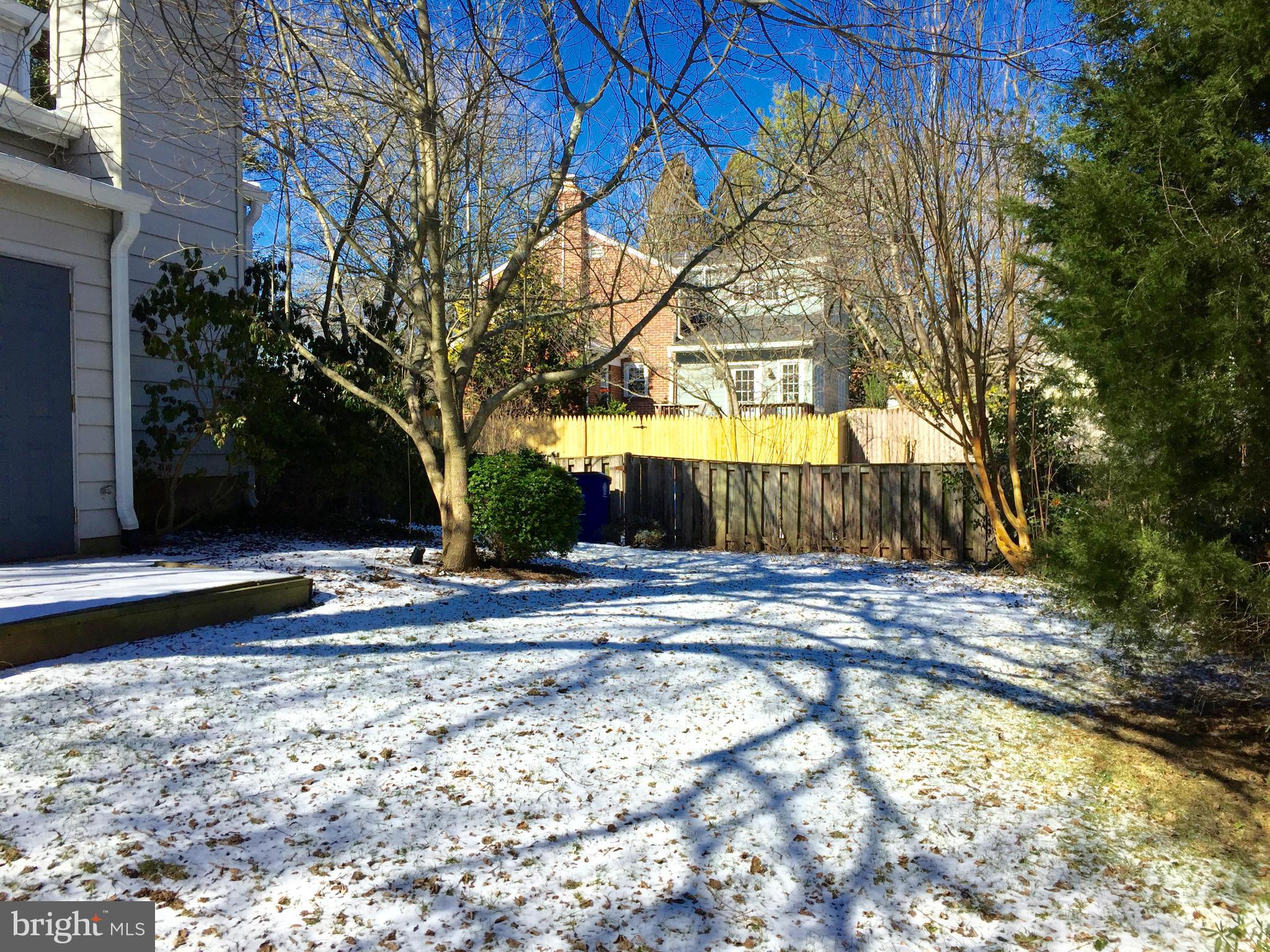 4915 Redford Road Bethesda, MD 20816 - Photo 14 of 15 a view of a yard with wooden fence