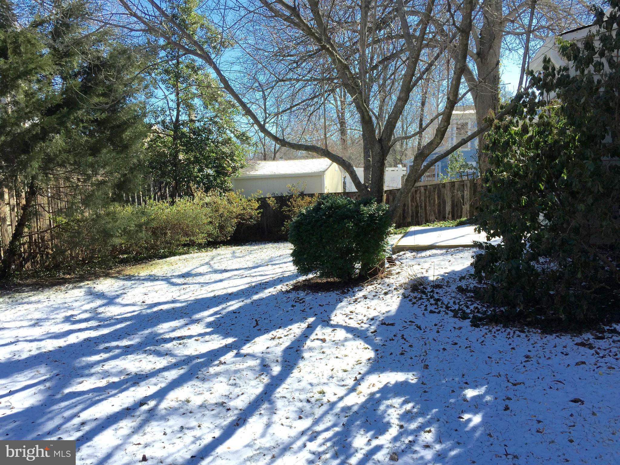 4915 Redford Road Bethesda, MD 20816 - Photo 15 of 15 a front view of a house with a yard