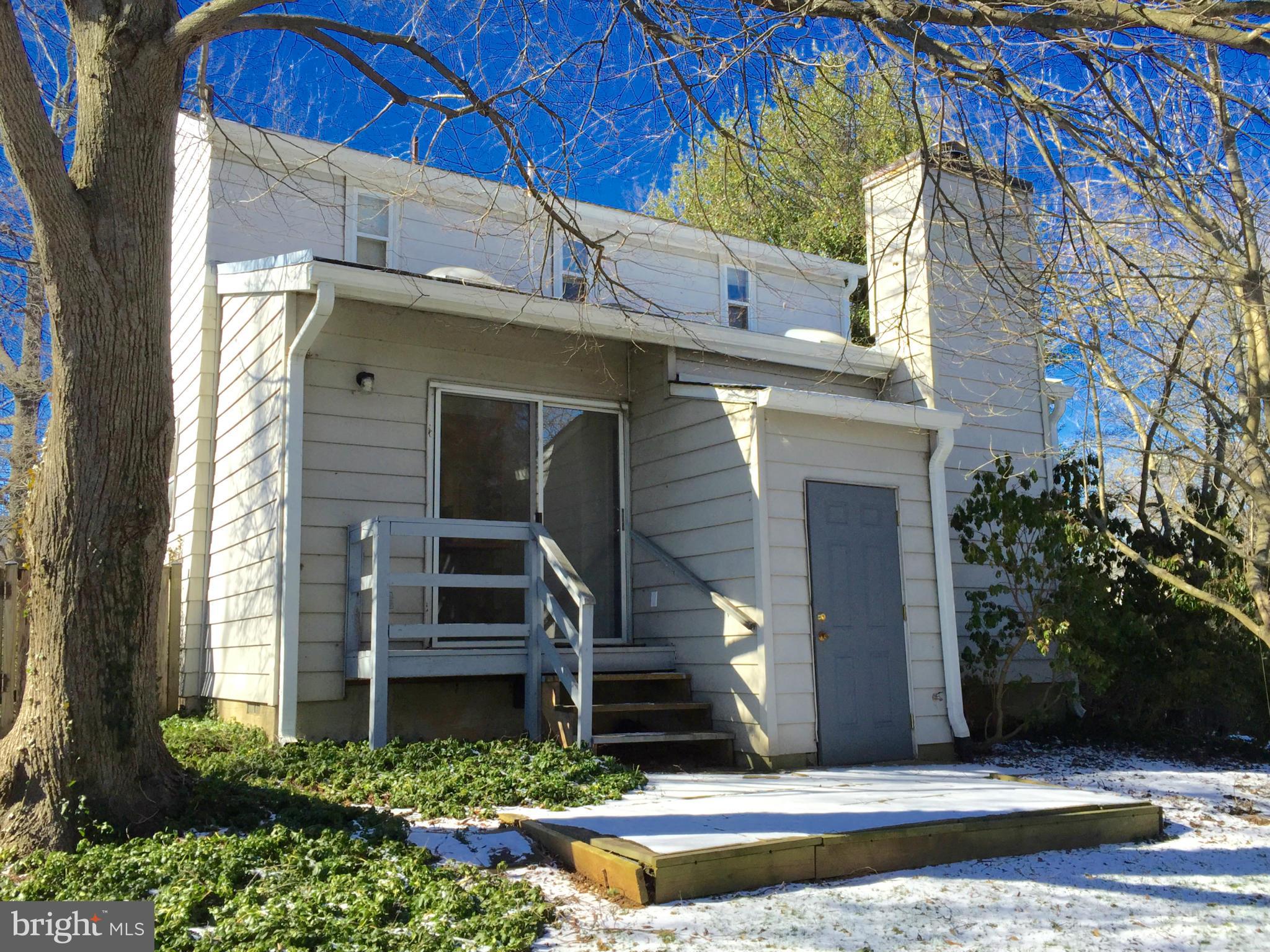 4915 Redford Road Bethesda, MD 20816 - Photo 3 of 15 a front view of a house with a yard