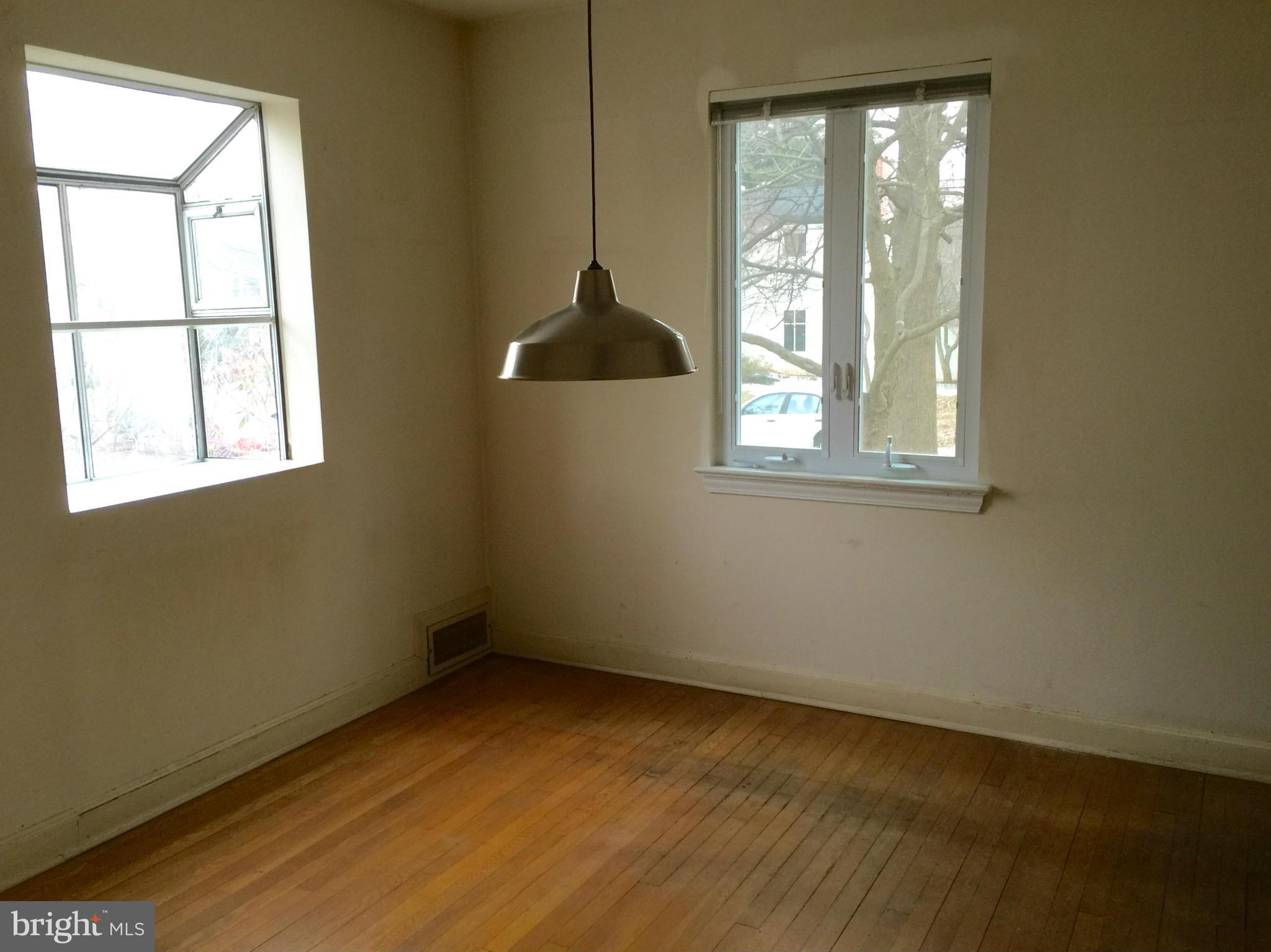 4915 Redford Road Bethesda, MD 20816 - Photo 6 of 15 an empty room with a window