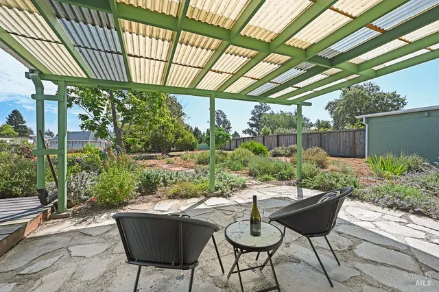 a view of yard with seating space