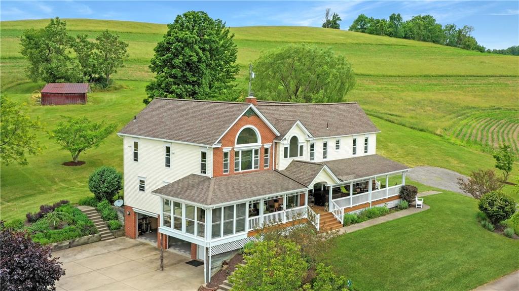 160 Eberle Road Hickory, PA 15340 - Photo 1 of 25 Gorgeous 4600 sq ft home , part original farmhouse w/character and part New Addition. Floor plan flows perfectly! Lush Landscape by Bedners Greenhouse & Views for days