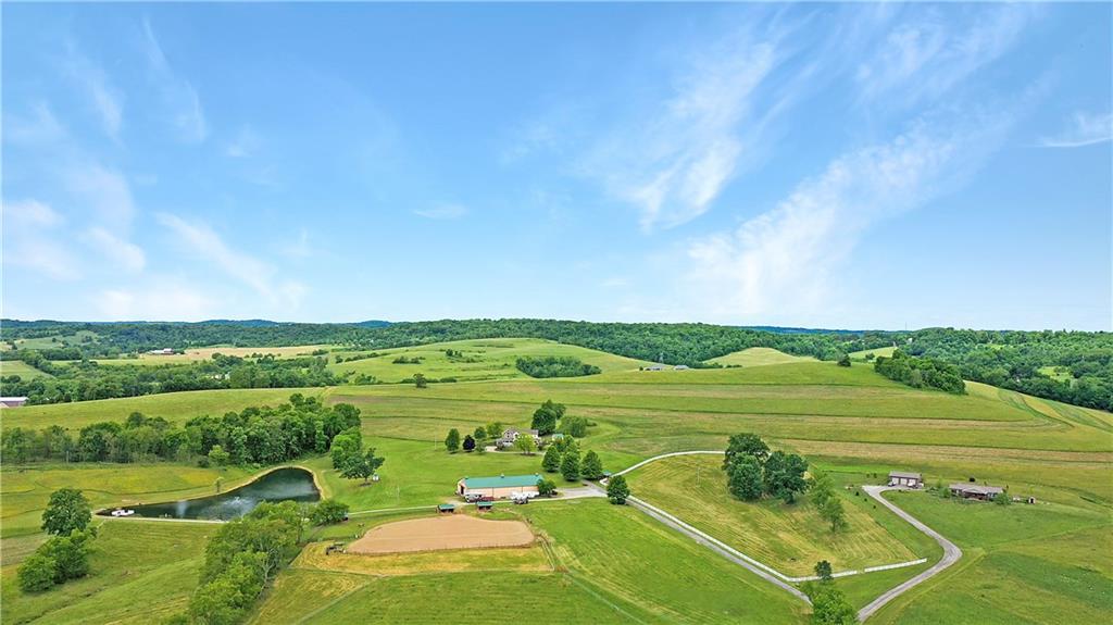 160 Eberle Road Hickory, PA 15340 - Photo 2 of 25 Amazing Aerial View of the entire Farm. Additional 10 acres are to the left of the lake. Riding ring, 7 fenced pastures! The business ideas are Endless: WEDDING VENUE, HORSE FARM, CHRISTMAS TREE FARM, BED AND BREAKFAST~