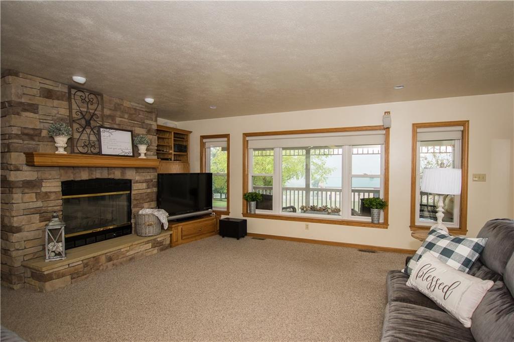 160 Eberle Road Hickory, PA 15340 - Photo 16 of 25 LARGE Family Room with a gorgeous Stone Fireplace and wall of windows for natural lighting~