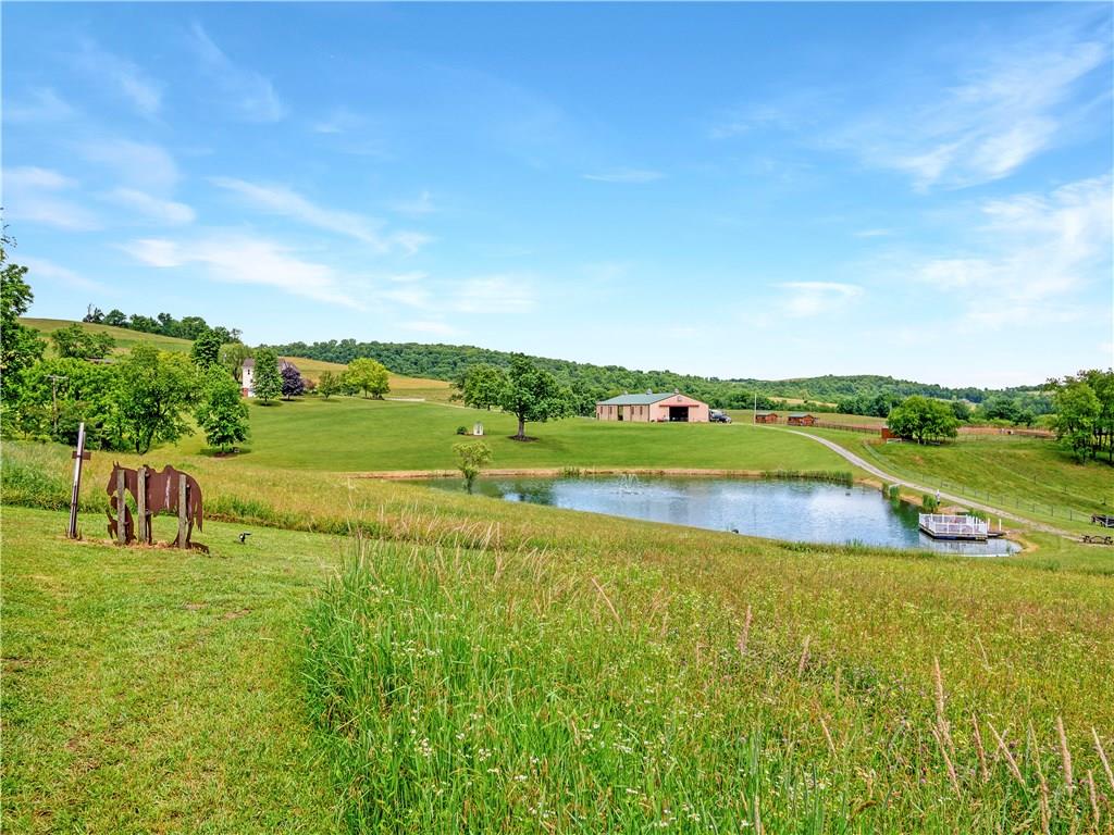 160 Eberle Road Hickory, PA 15340 - Photo 3 of 25 1.8 Acre Stocked Lake with Dock~ Head down to your very own lake...fish, kayak, canoe, swim. There is a small sandy beach for the kids