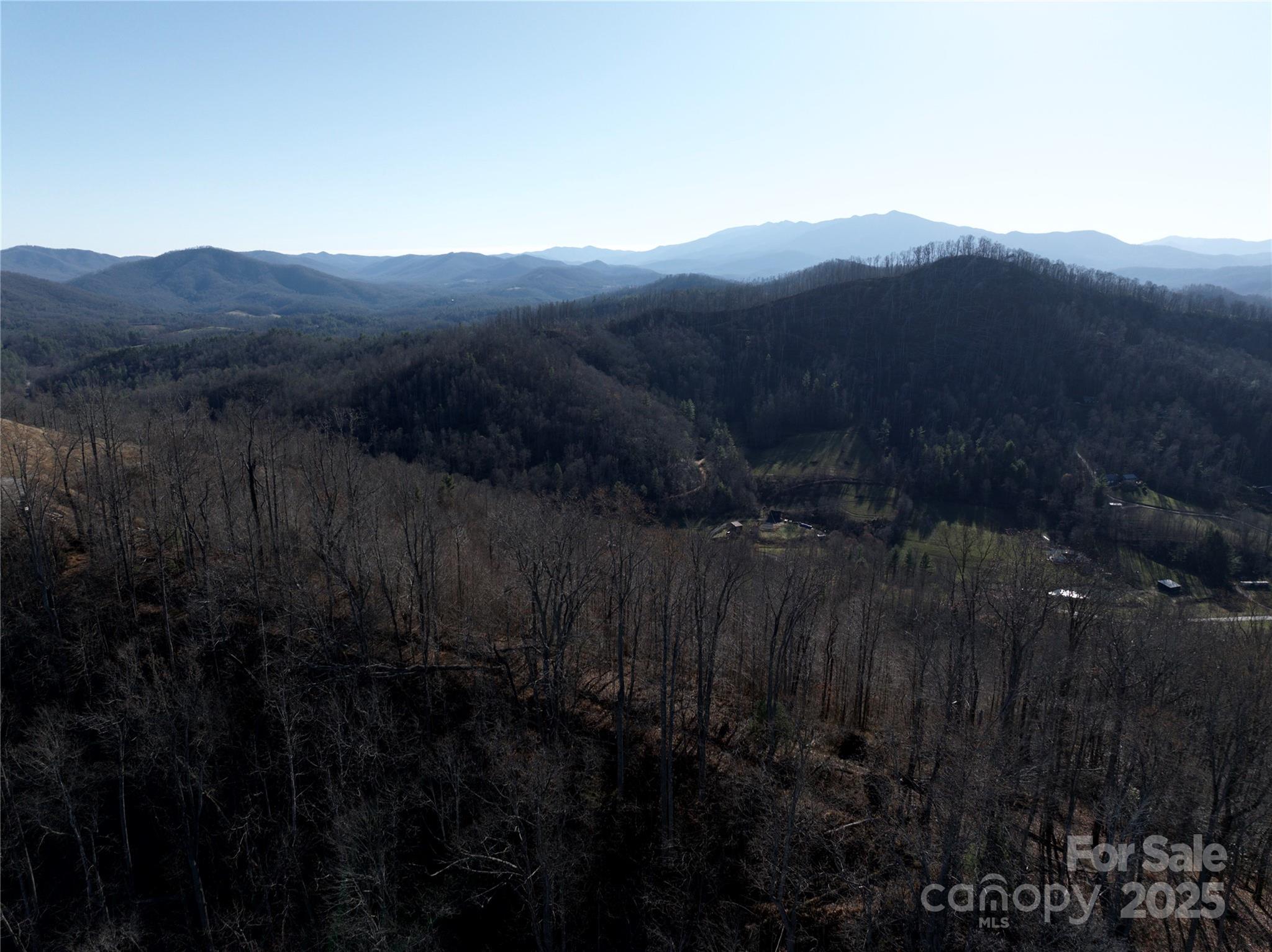 a view of a house with a field