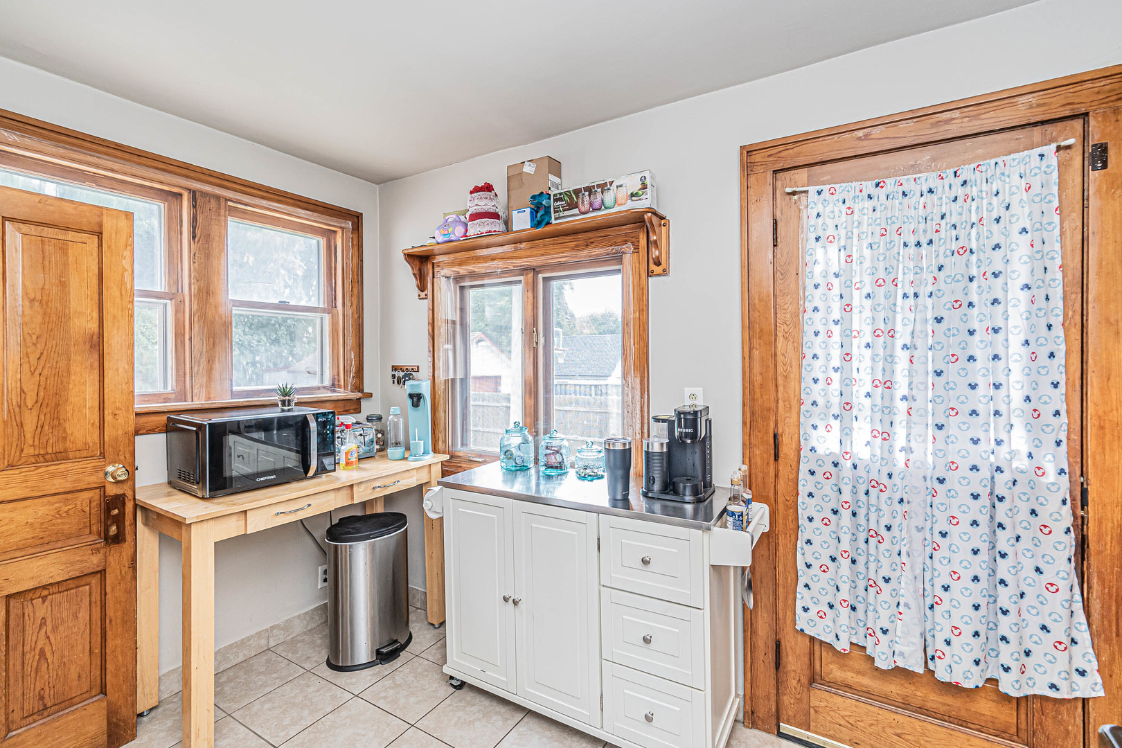 633 Chester Avenue Elgin, IL 60120 - Photo 14 of 29 a room with lots of furniture and a large window