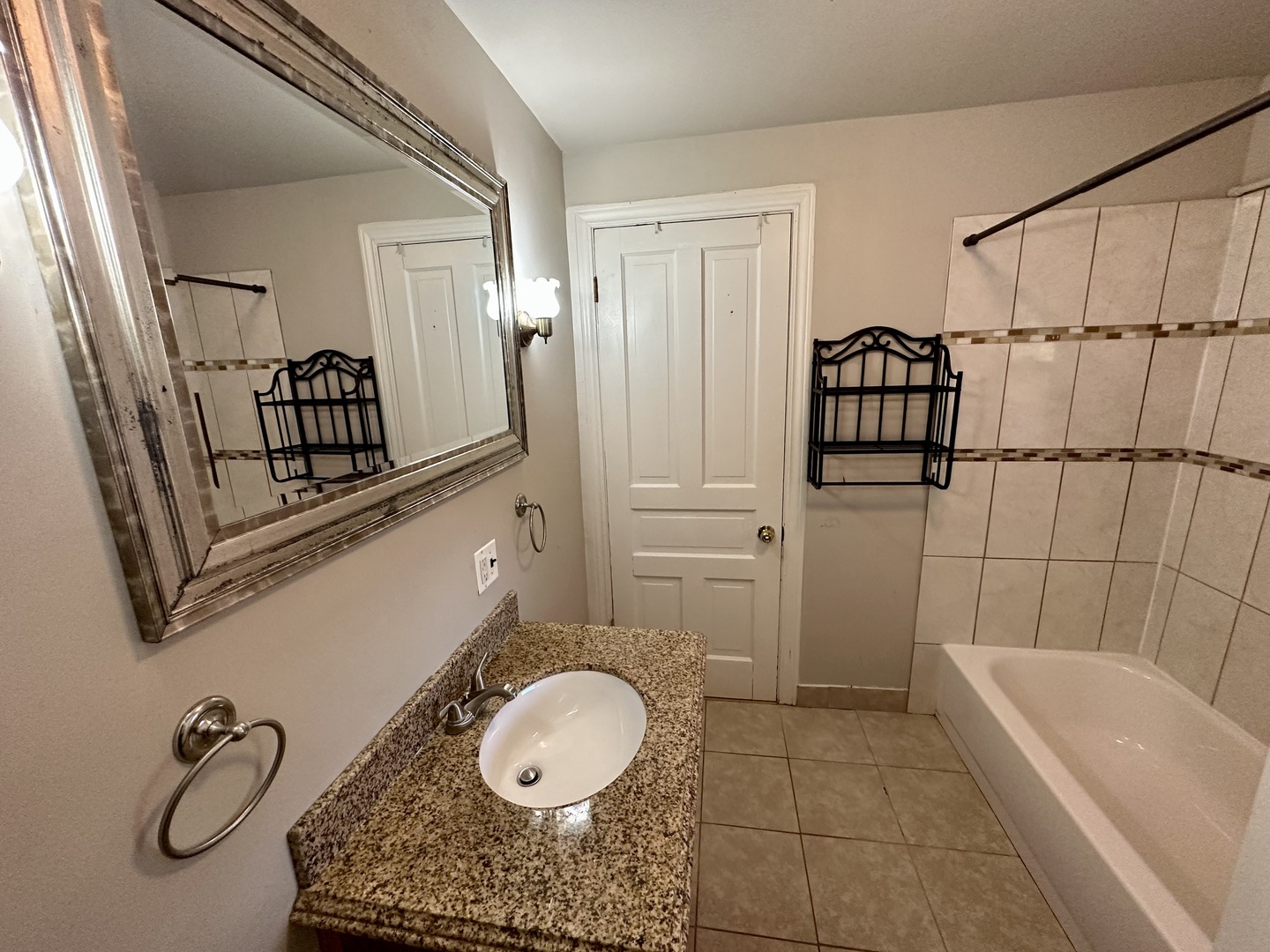 633 Chester Avenue Elgin, IL 60120 - Photo 15 of 29 a bathroom with a sink a toilet and shower