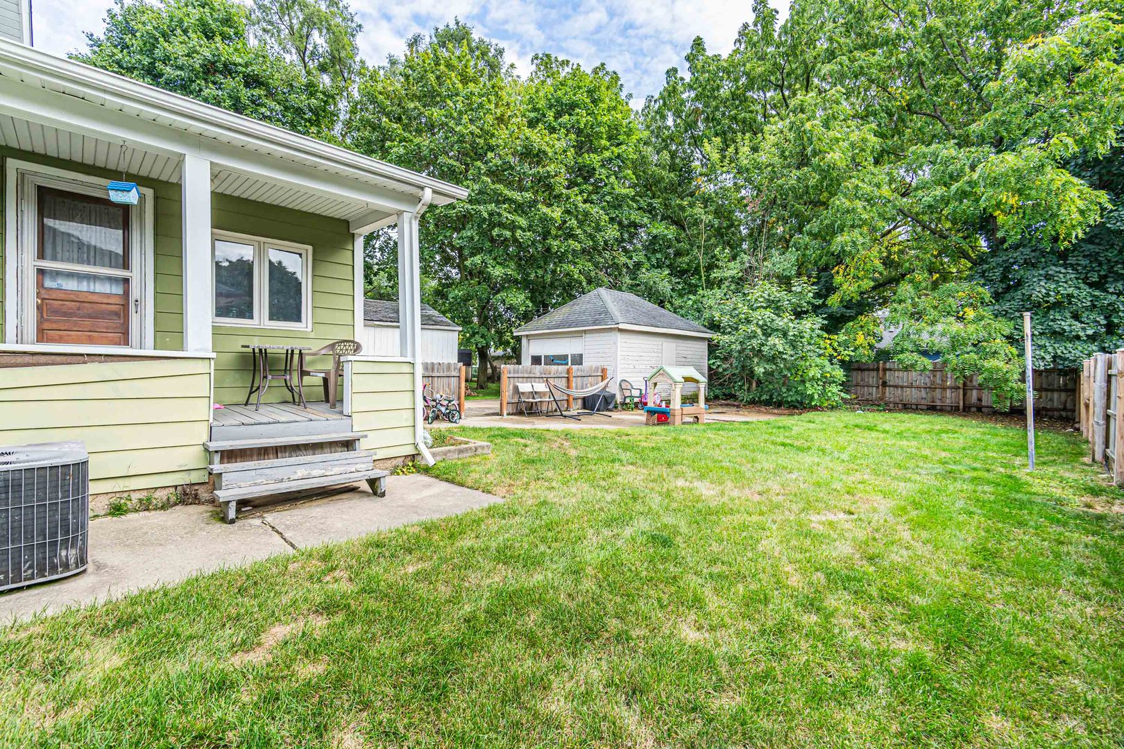 633 Chester Avenue Elgin, IL 60120 - Photo 23 of 29 a house view with a sitting space and garden