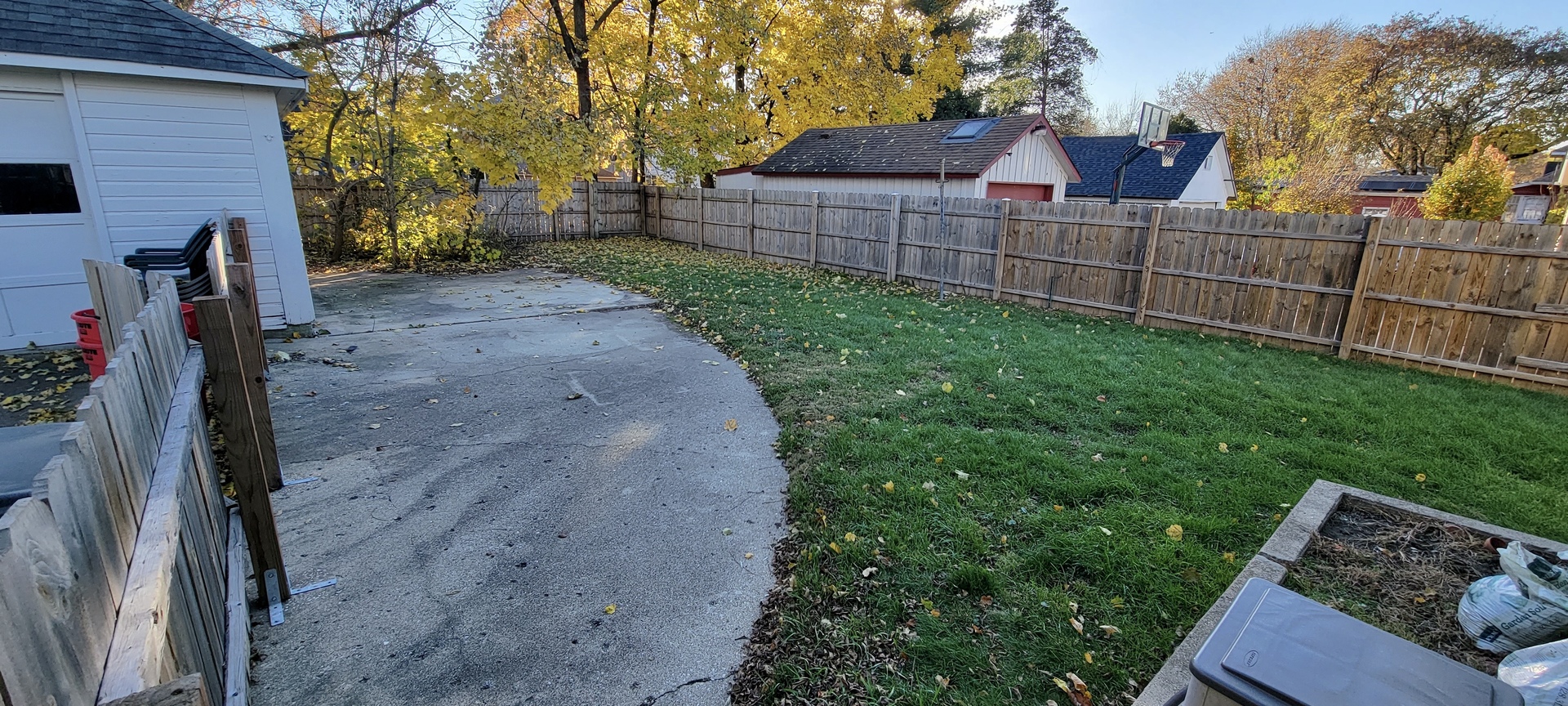 633 Chester Avenue Elgin, IL 60120 - Photo 24 of 29 a view of a backyard with wooden fence